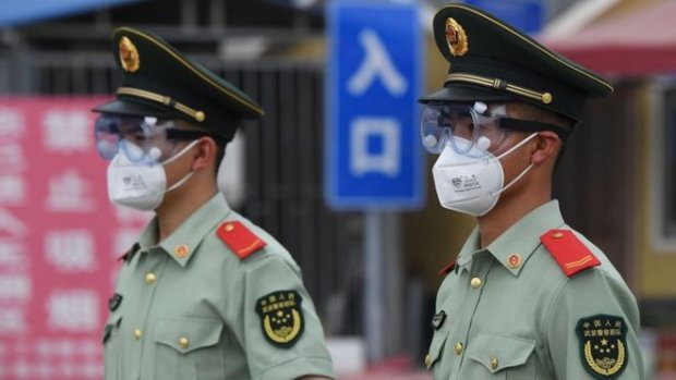 Koronavirus: Bozorda virus tarqalishi tufayli Pekinning bir qismi yopildi