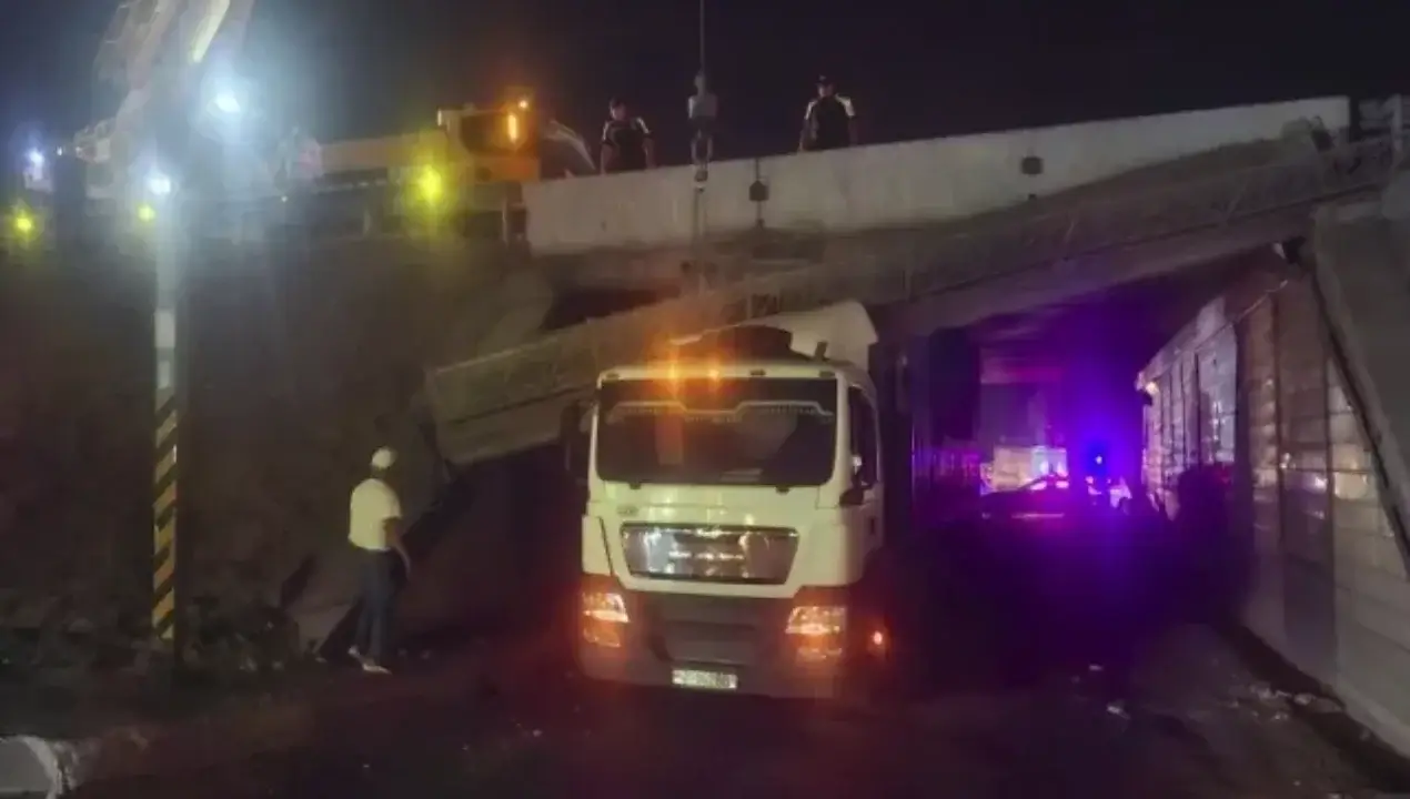 The truck crashed into the bridge, not following the sign.