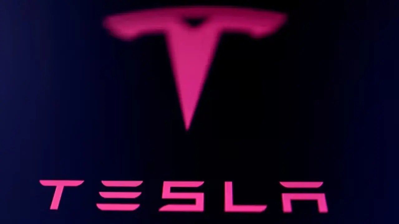 Tesla sued over hiring policy