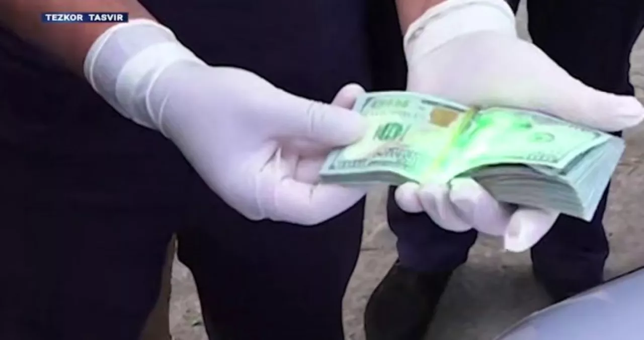 Ангренде фермерден пара алған салықшы ұсталды