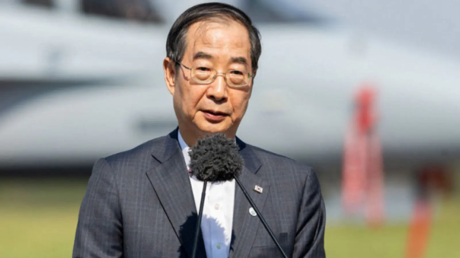 Сеульский суд приговорил бывшего премьер-министра Хан Док-су к 23 годам тюремного заключения