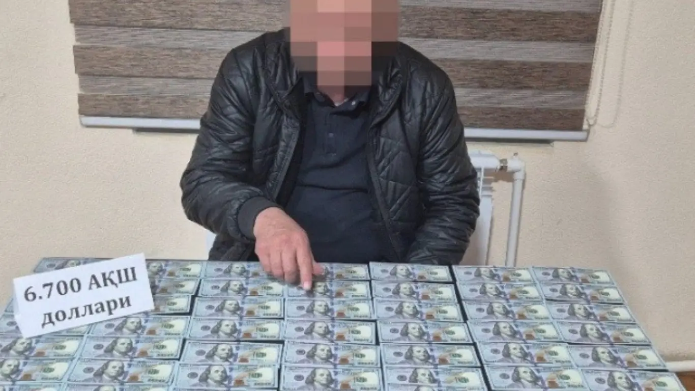 Ғаллаоролда мансабдор ўғлининг ерини сотишда пора билан ушланди