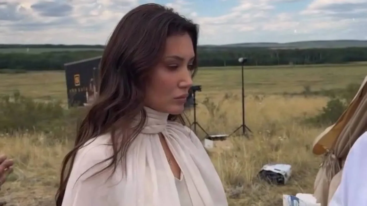 Yulduz Rajabova seen with her husband during a filming session
