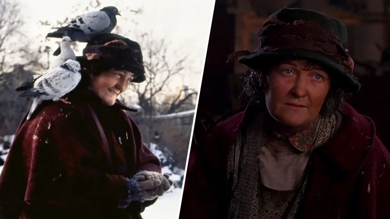 A woman wearing a hat and coat with pigeons perched on her shoulders and head.