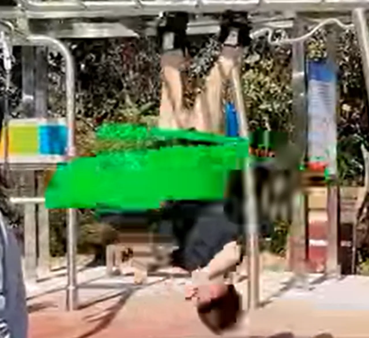 Guinness World Record: Chinese Man Spins 33 Hoops Upside Down (Video)