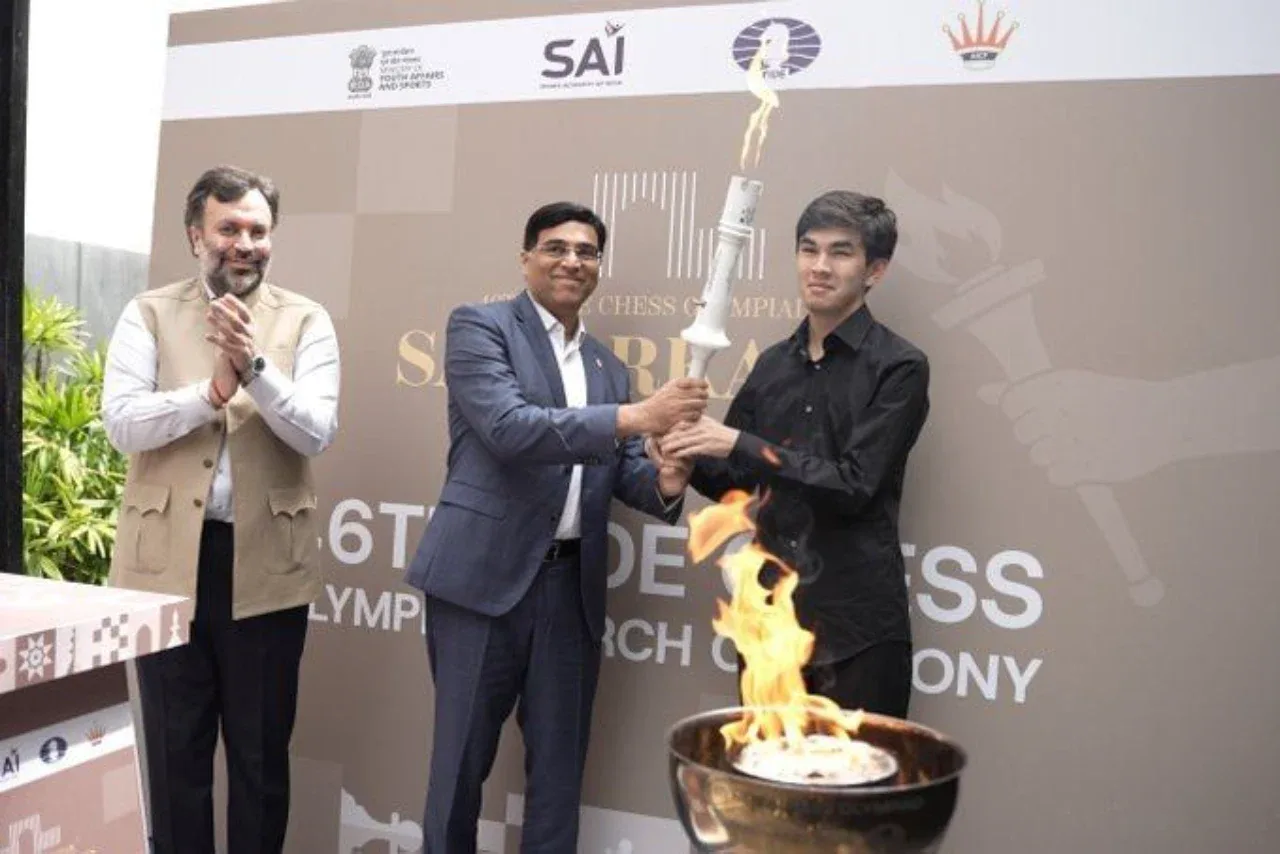 Olympic Flame heads to Samarkand: Anand hands over the sacred torch to Sindarov