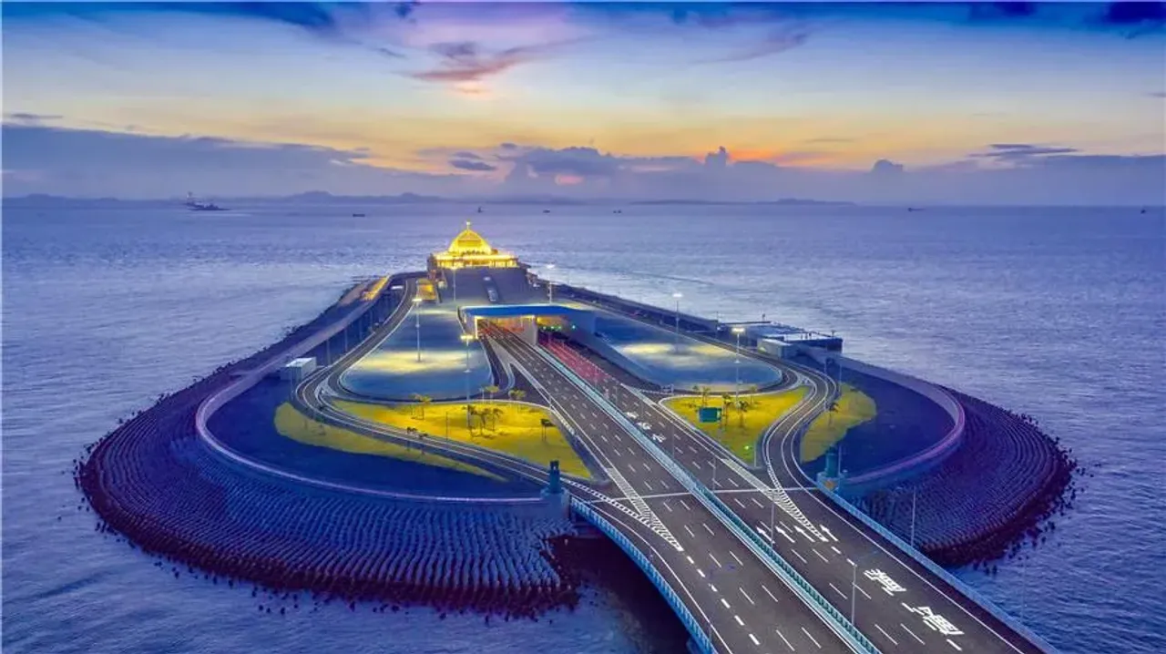 Road and tunnel entrance located on an artificial island in the middle of the sea.