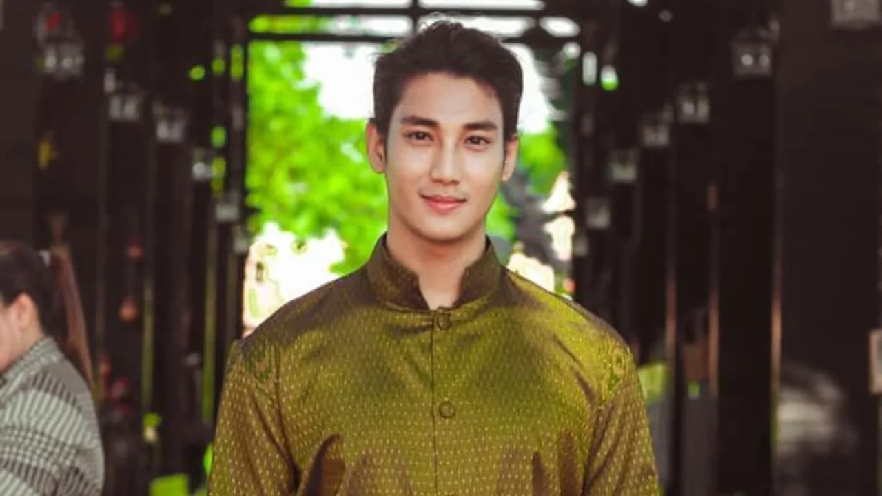 Why was Paing Takhon, one of the world's most handsome men, imprisoned?