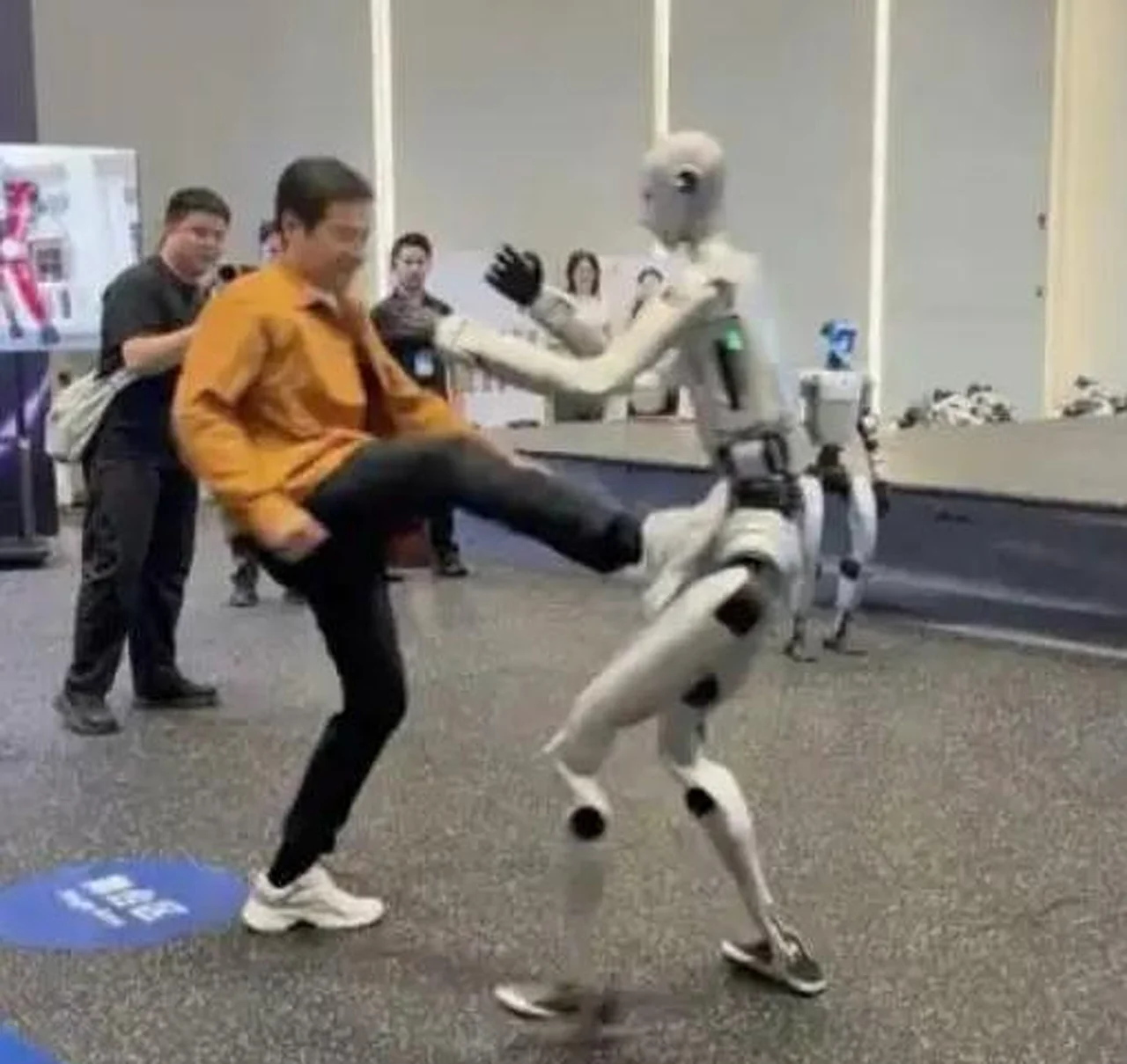 Xiaomi CEO holds unexpected sparring match with humanoid robot