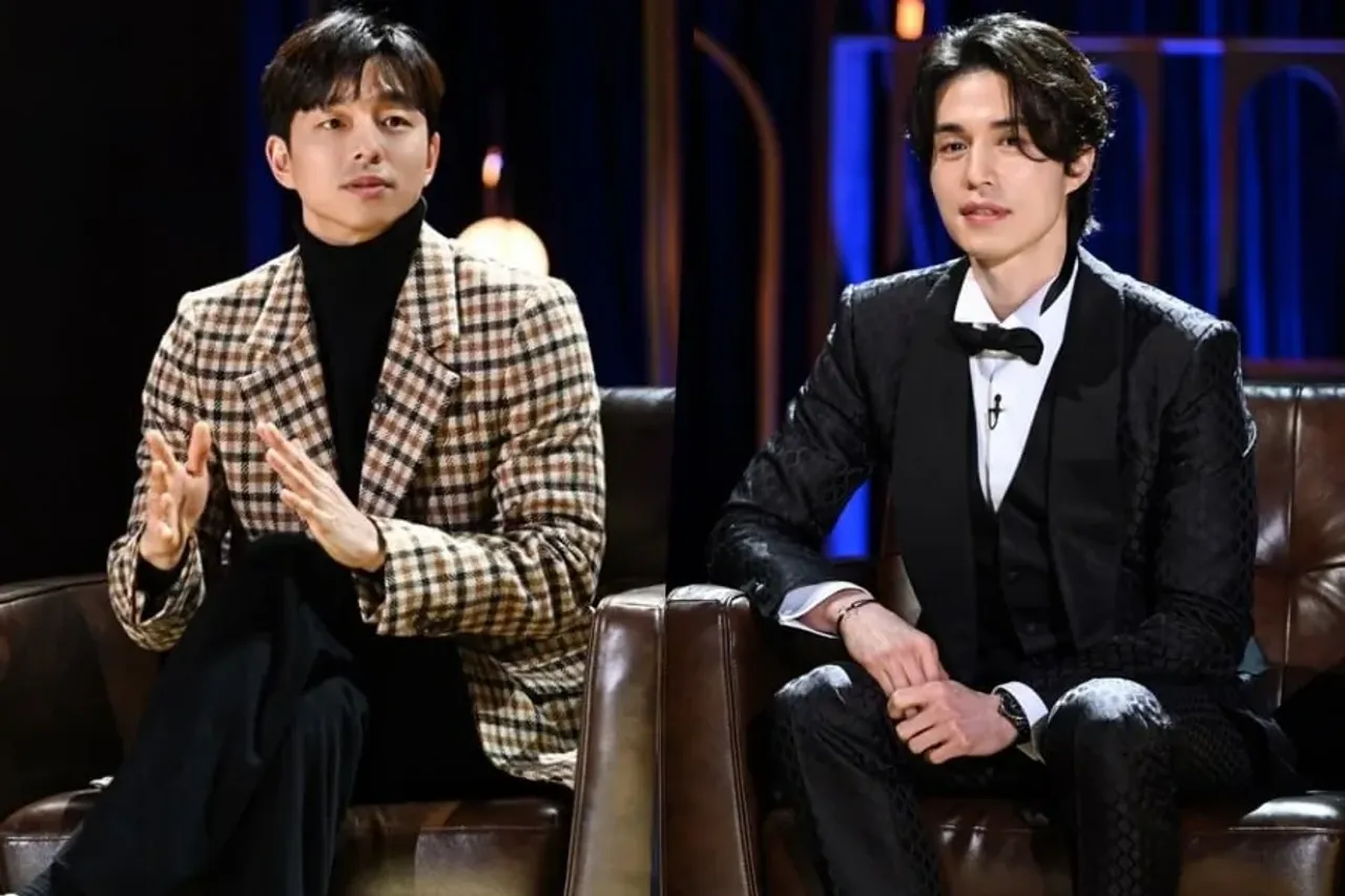 Two Korean actors, Gong Yoo and Lee Dong-wook, sitting in studio chairs.