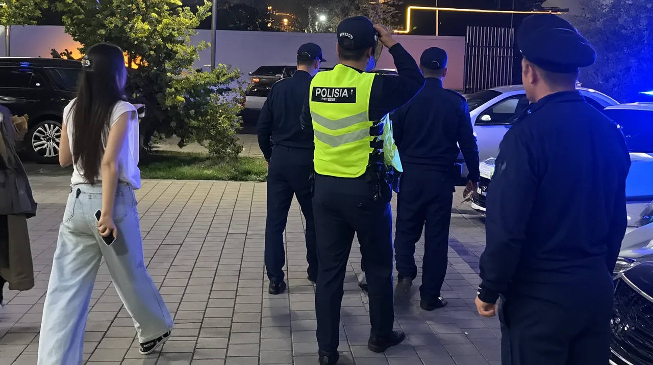 In Almaty, woman creates a disturbance trying to pull her acquaintance away from police officers (video)