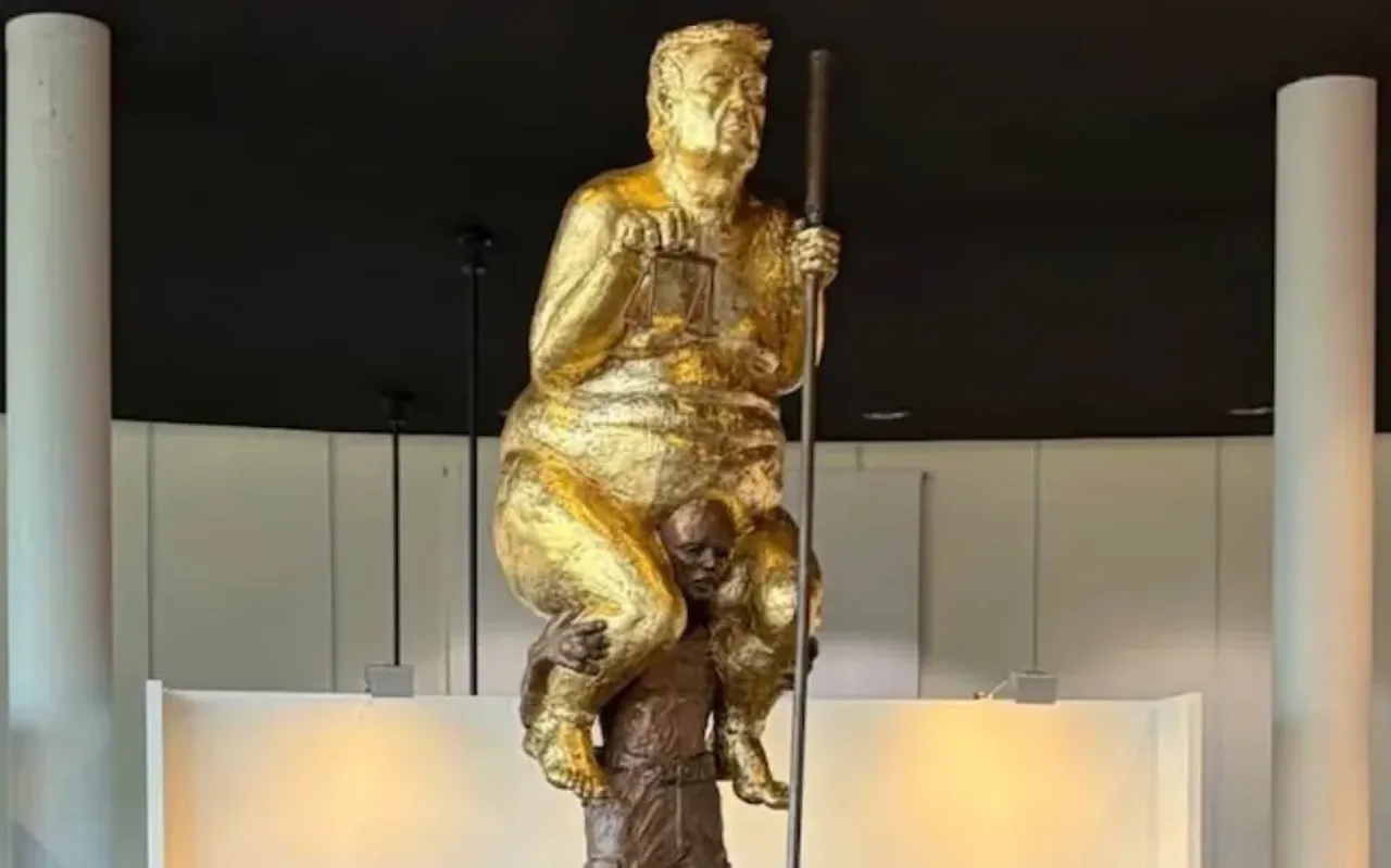 Golden naked statue of Trump displayed at the European Parliament