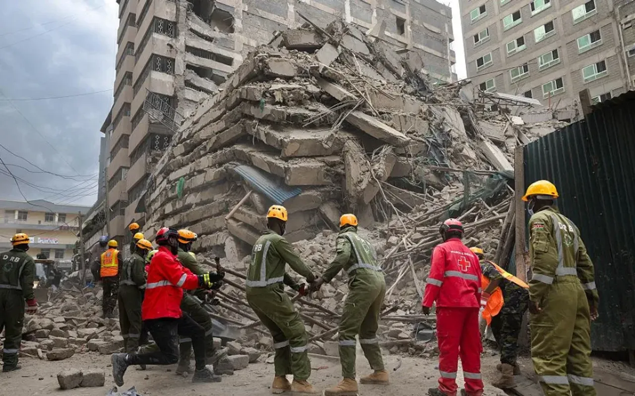 Multistory building under construction collapses in Kenya, debris crushes commercial stalls