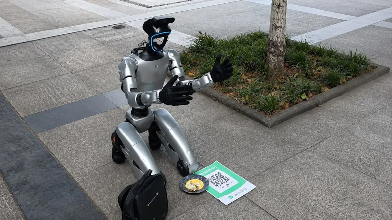 Kumushrang robot piyodalar yo‘lagida tiz cho‘kib, QR kod orqali xayriya so‘ramoqda.